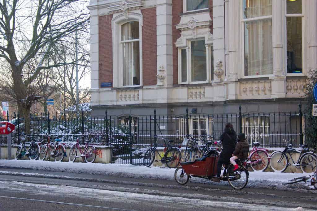 Riding bicycles with kids in Amsterdam
