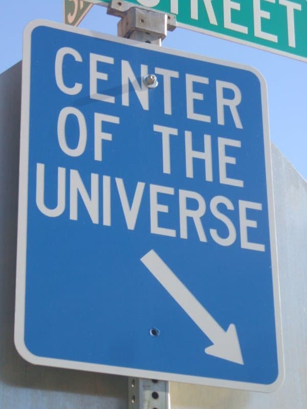 center of the universe street sign 