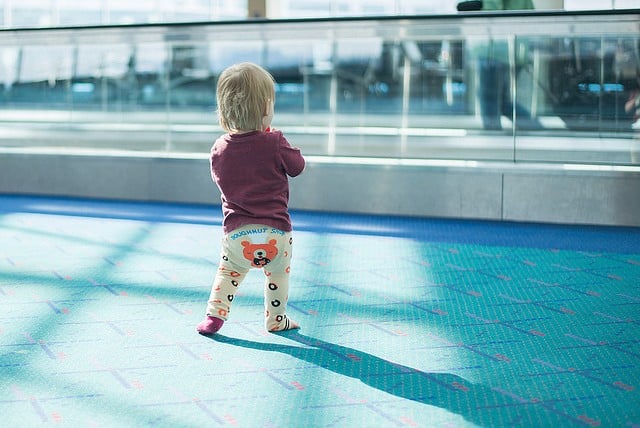 Traveling with baby in the airport in pajamas
