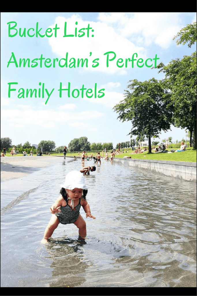 Little Asian girl playing in water in Amsterdam