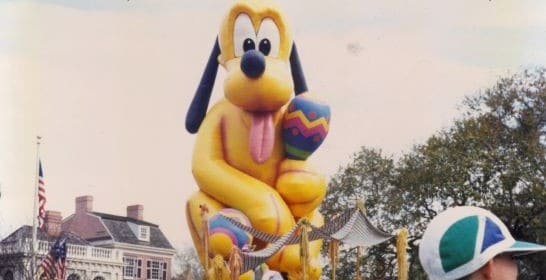 Pluto float at a parade in Disney World