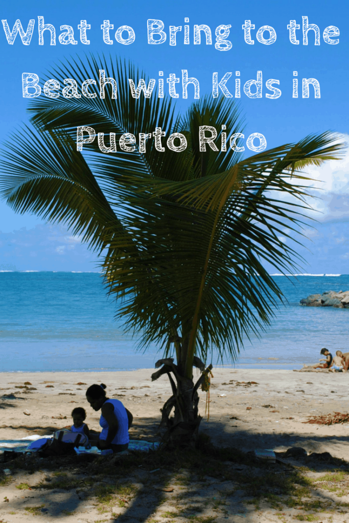 Beach in Puerto Rico with palm tree and playing children