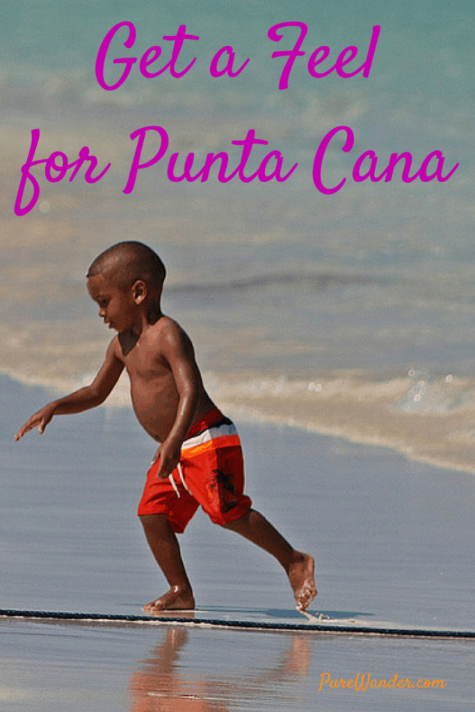 Little boy riding the waves in Punta Cana Mexico