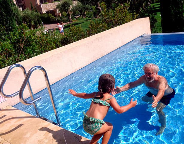 Amalia and Papou playing at the pool in the Westin, Greece