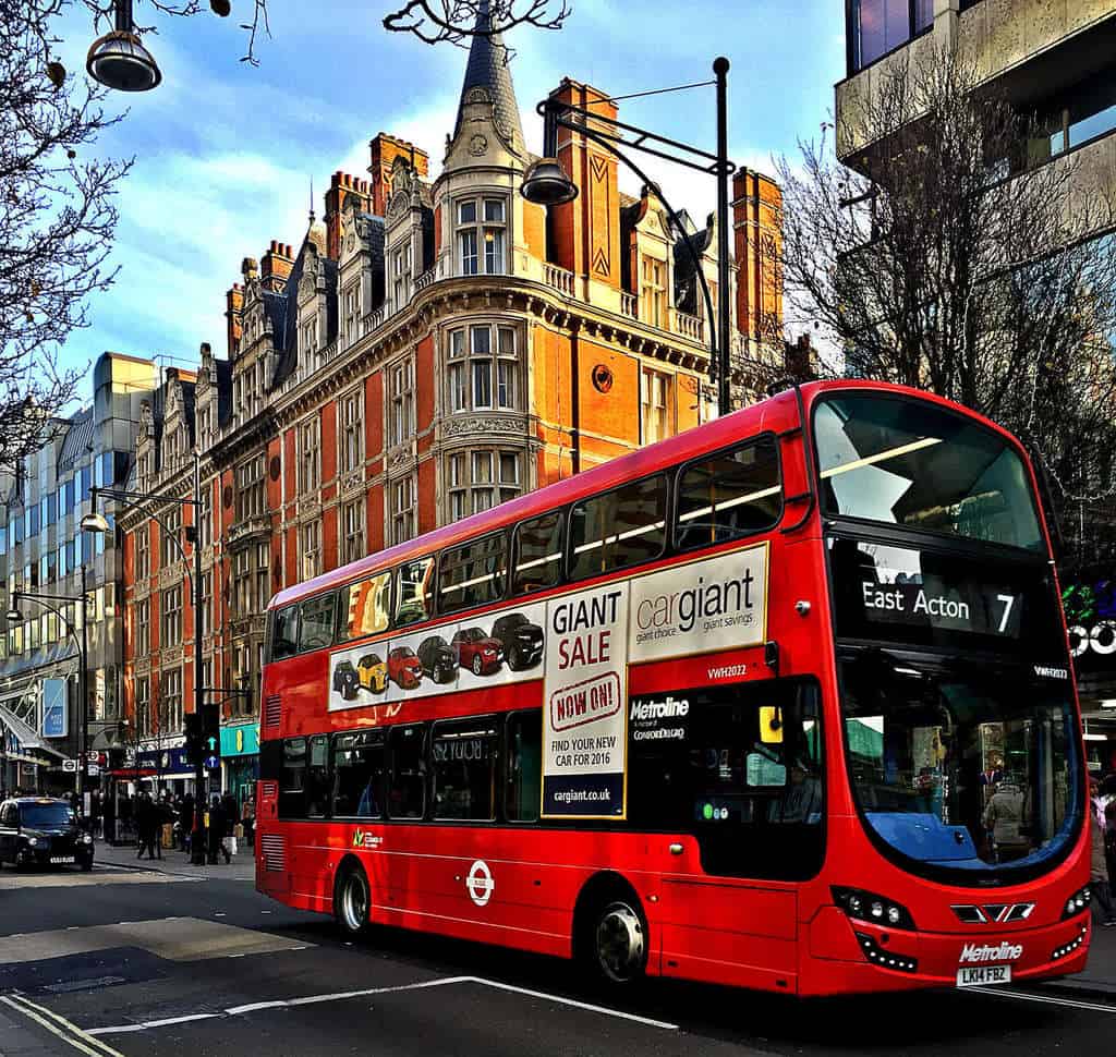 double decker bus on oxford street in london by eileen cotter wright