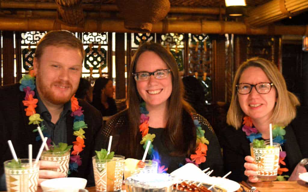 three people at bar in trader vic's in London