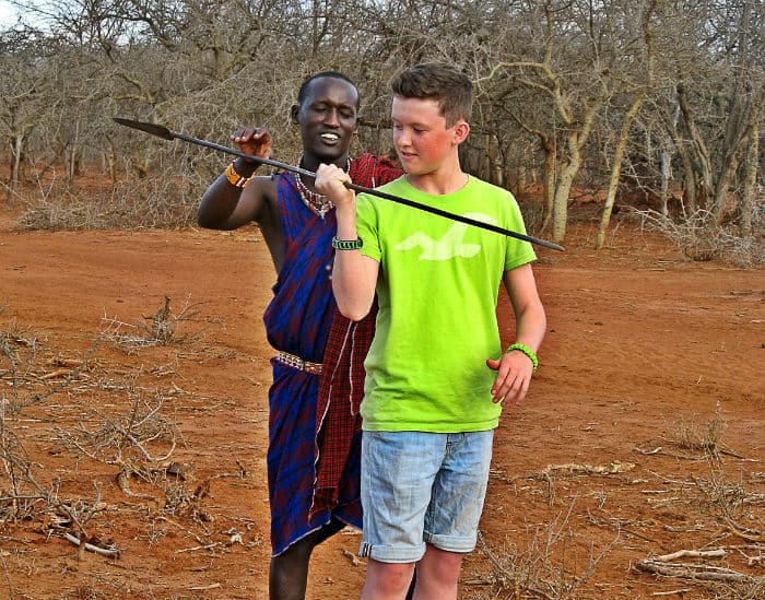 Tom learning to throw a spear