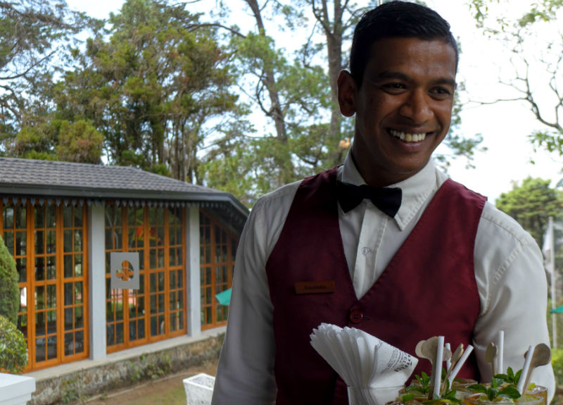 waiter at jetwing hotel st andrews sri lanka by eileen cotter wright