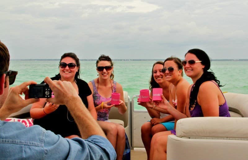 girls group photo in boat