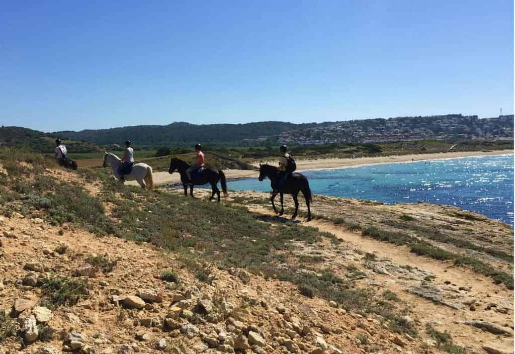 horseback riding menorca group by the sea