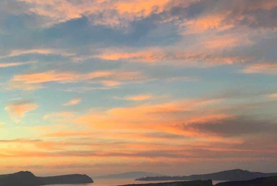 santorini sunset with pink, blue and orange