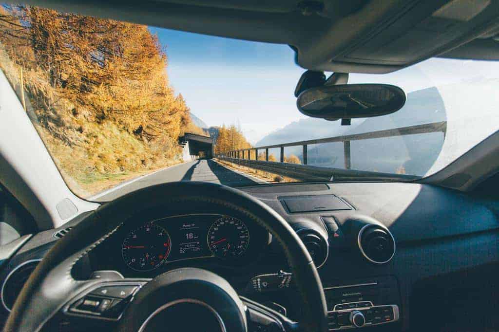 interior of a car on the road in fall