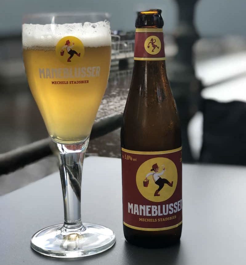 beer bottle and glass in belgium at lunch mechelen de cirque