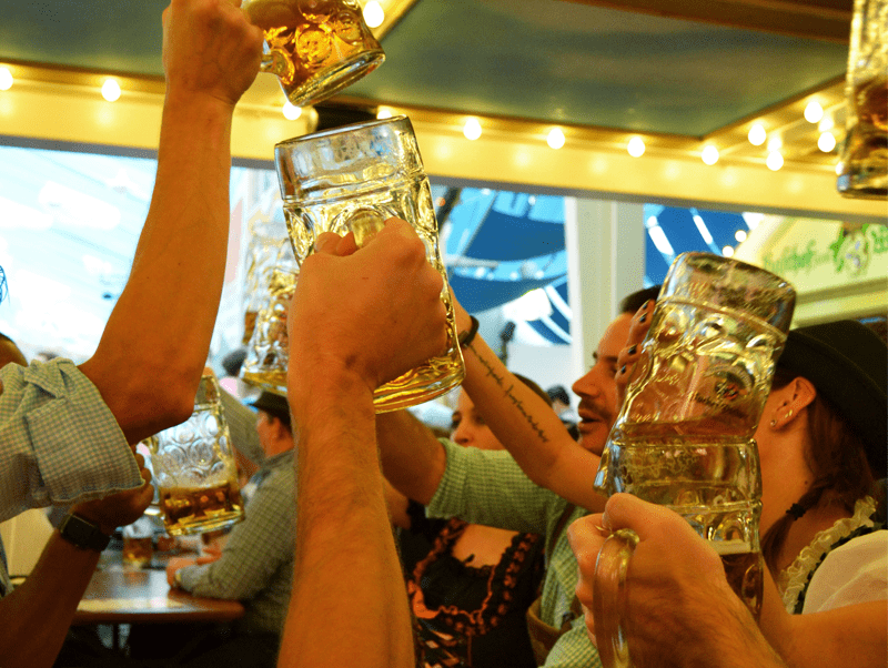 Beer Steins Clinking at Oktoberfest!