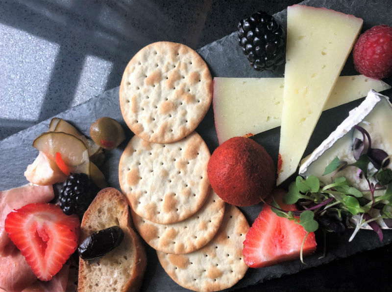 charcuterue plate with cheese and berries row hotel somerville