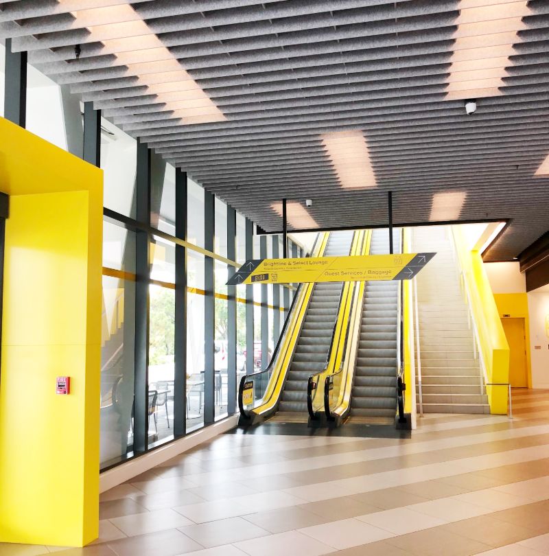 yellow escalator inside the brightline trains or Virgin Trains USA in Florida