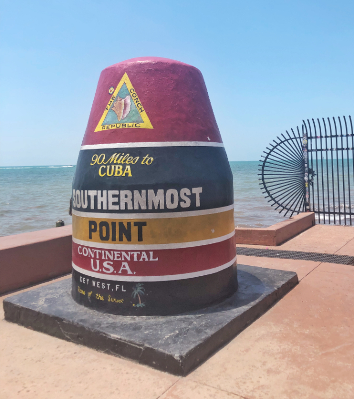 striped southernmost point buoy in key west florida