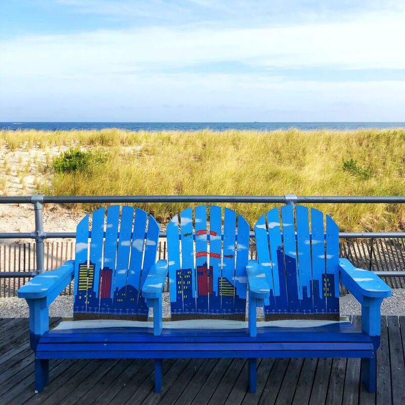 Painted chairs on the boardwalk the Ocean Resort Atlantic City
