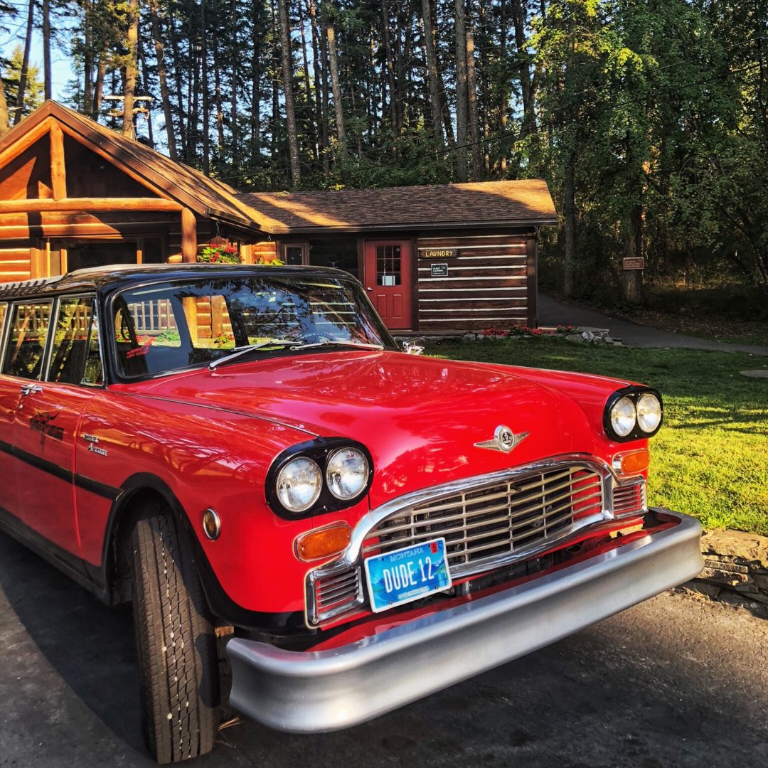 red vintage car at flathead lake lodge montana
