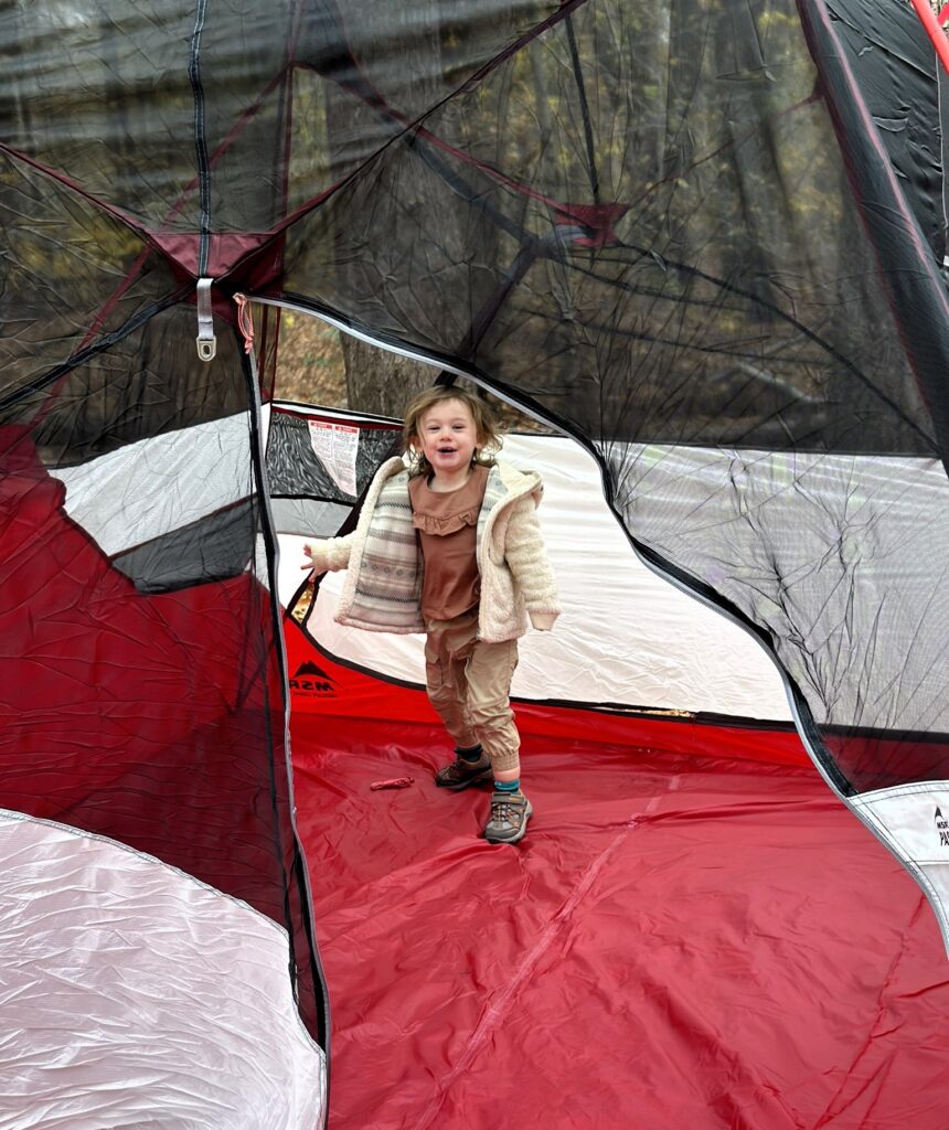 toddler inside MSR 6 person tent