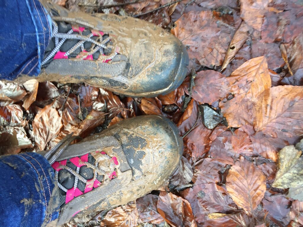 muddy hiking boots in wales