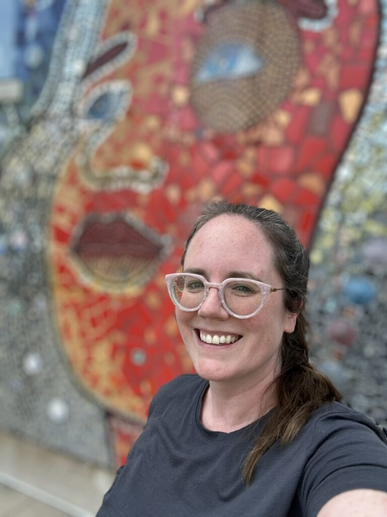 eileen cotter wright at mural in grand rapids michigan