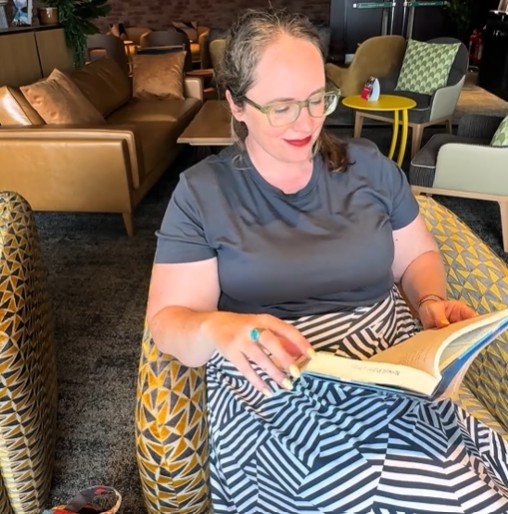 eileen at the airport lounge in unbound merino basic t