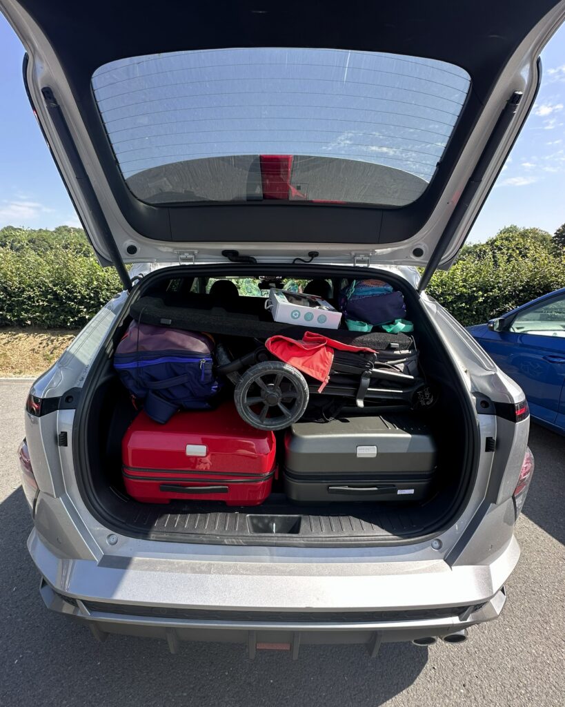 roam luggage duo in car trunk